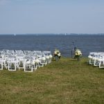 White Resin Chair Waterfront Ceremony
